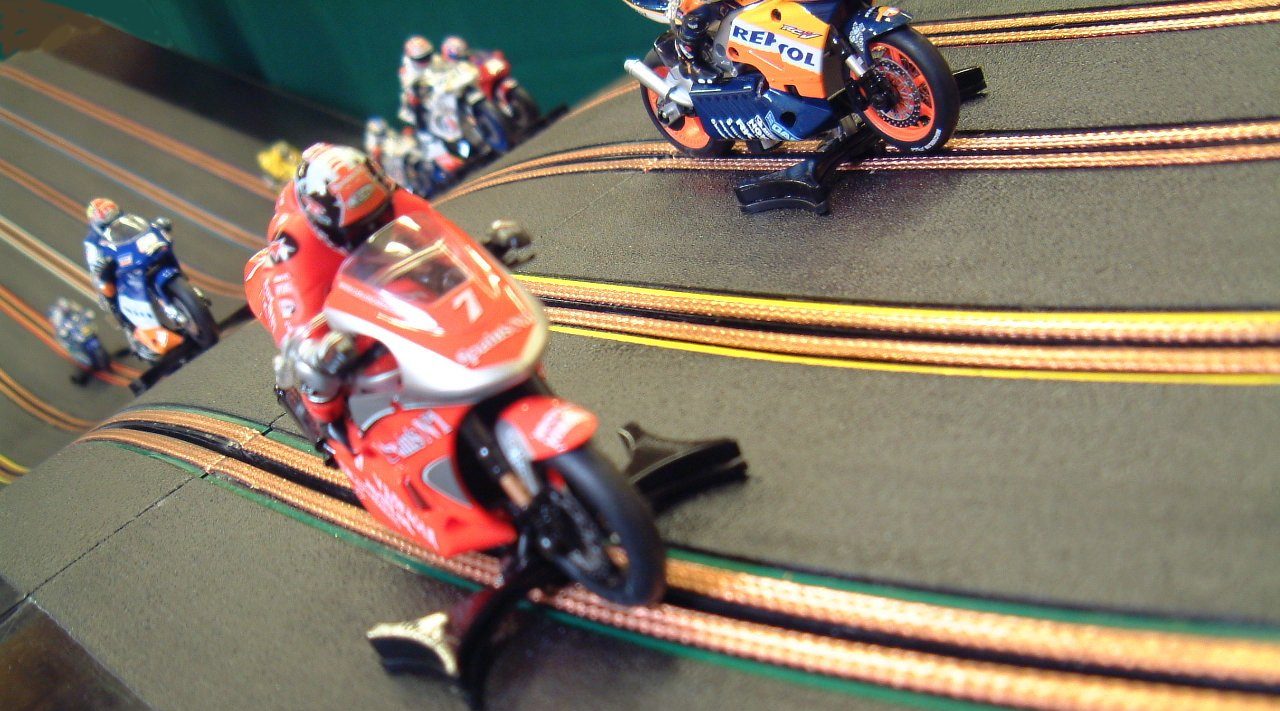 miniracing.com Giant Scalextric 8 Lane track racing with custom made moto GP motorbikes 